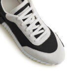 hermes-paris-bouncing-sneaker-white-black-h221897zh11390-side_ef59b941-eccc-4ff7-a139-b547d341dd6d